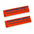 Two red Basketball Witch Shooting Spot Markers with Anti-Slip Case with blue text on a white background