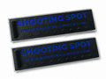 Two black Shooting Spot Markers with blue text and triangle patterns on a white background
