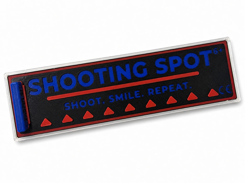 Marker with 'SHOOTING SPOT' text and design on a white background,